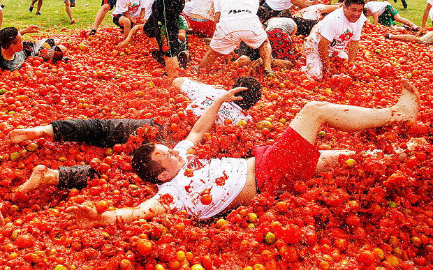 Tomatina Festival, Bunol, Spain - 03 Jun 2013...Mandatory Credit: Photo by JHON PAZ / Rex Features (2428793b) Revellers take part in the annual tomato fight Tomatina Festival, Bunol, Spain - 03 Jun 2013
